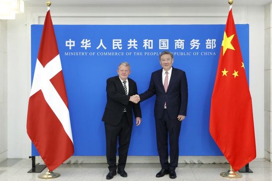商务部部长王文涛会见丹麦外交大臣拉斯穆森（图）  第1张